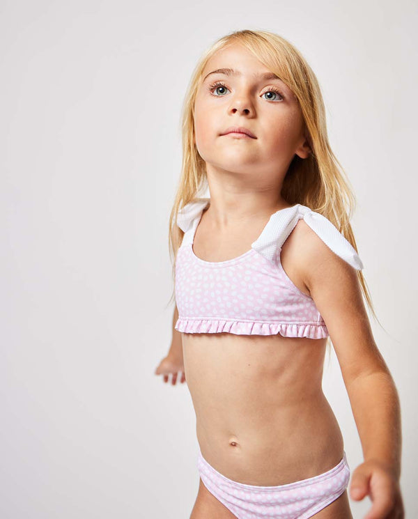 Bikini rosa con motas blancas